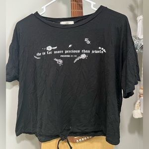 Cropped black Christian tee.